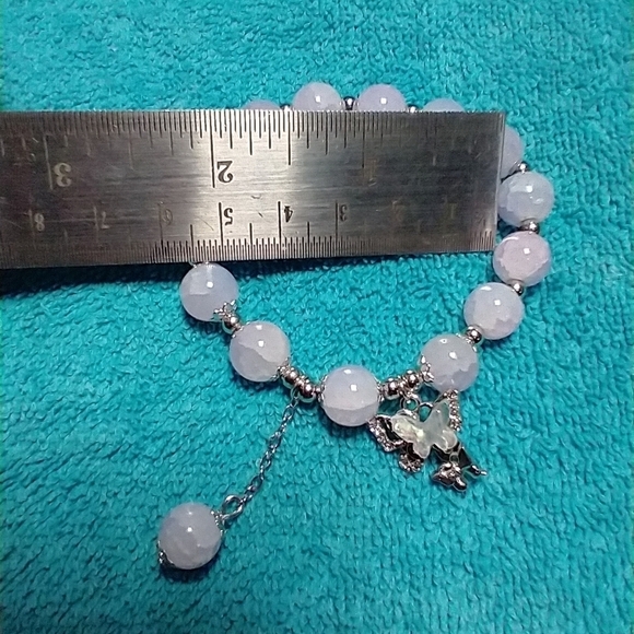 Silvertone white beaded aurora butterfly stretch bracelet - Picture 3 of 4